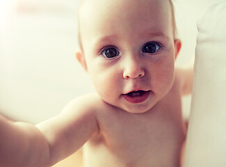 Image showing close up of happy little baby boy or girl at home