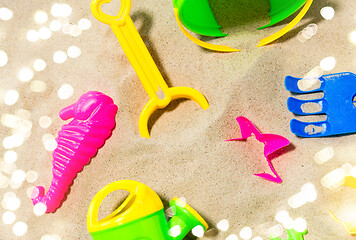 Image showing close up of sand toys kit on summer beach