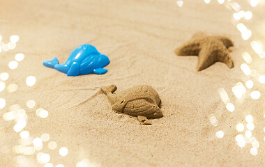 Image showing sand shape made by whale mold on summer beach