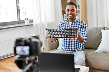 Image showing male video blogger with keyboard videoblogging