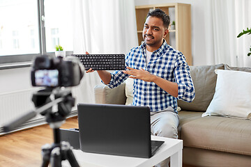 Image showing male video blogger with keyboard videoblogging