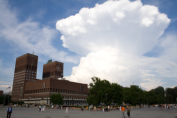Image showing Huge cloud over city hall