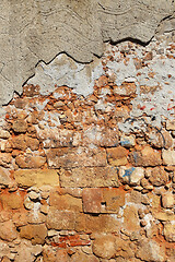 Image showing Very ancient destroyed brick wall with concrete