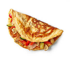 Image showing omelette stuffed with vegetables and ham