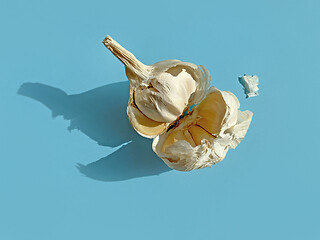 Image showing garlic on blue background