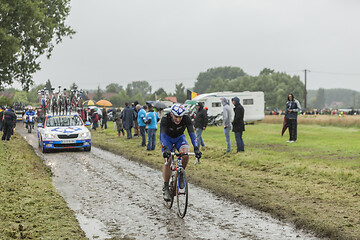 Image showing The Cyclist Mickael Delage on a Cobblestone Road - Tour de Franc