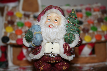 Image showing Santa Claus with presents