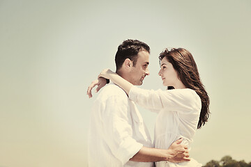 Image showing happy young couple have fun on beach