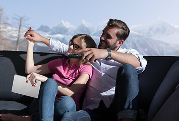 Image showing Young couple watching television