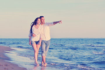 Image showing young couple  on beach have fun