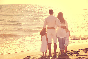 Image showing happy young  family have fun on beach