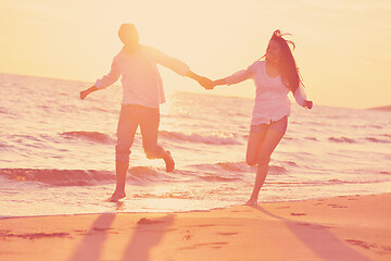 Image showing young couple  on beach have fun