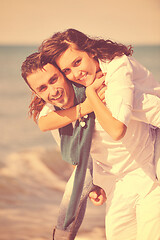 Image showing happy young couple have fun at beautiful beach