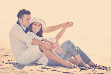 Image showing happy young couple have fun at beautiful beach