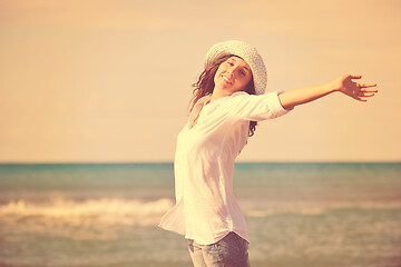 Image showing happy young woman on beach