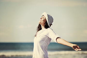 Image showing happy young woman on beach