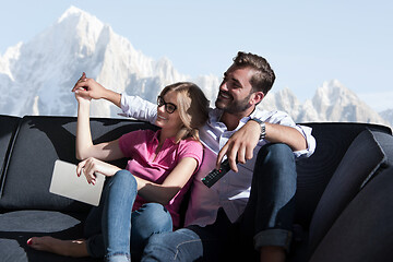 Image showing Young couple watching television