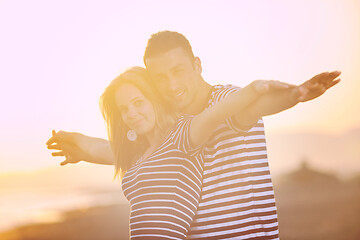 Image showing happy young couple have romantic time on beach