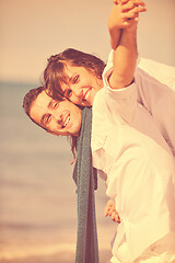 Image showing happy young couple have fun at beautiful beach