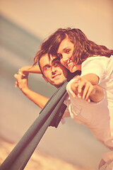 Image showing happy young couple have fun at beautiful beach