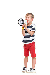 Image showing Little cute kid baby boy holding in hand and speaking in electronic gray megaphone