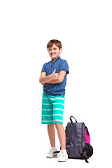 Image showing Full length portrait of cute little kid in stylish clothes looking at camera and smiling