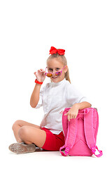 Image showing Full length portrait of cute little kid in stylish sunglasses looking at camera and smiling