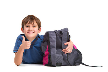 Image showing Full length portrait of cute little kid in stylish clothes looking at camera and smiling