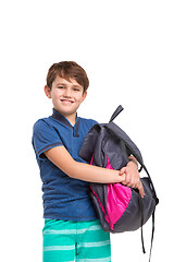 Image showing Full length portrait of cute little kid in stylish clothes looking at camera and smiling