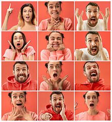 Image showing Beautiful women and man looking suprised isolated on coral