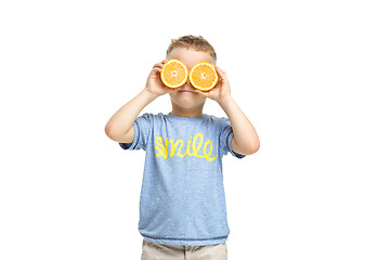 Image showing Full length portrait of cute little kid in stylish clothes with orange