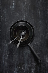 Image showing Kitchen utensils collection black colored on the came color background.