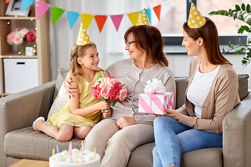 Image showing granddaughter greeting grandmother on birthday