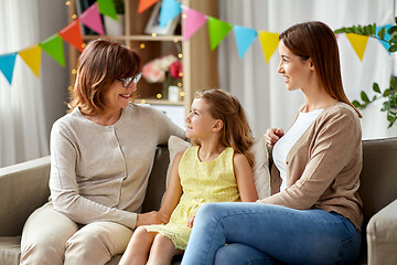 Image showing mother, daughter and grandmother at birthday party