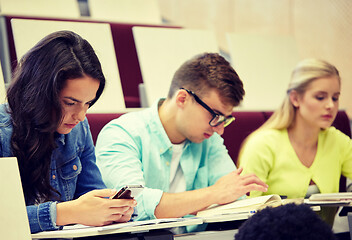 Image showing group of students with smartphone at lecture