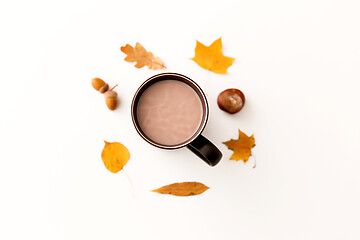 Image showing hot chocolate, autumn leaves, acorns and chestnut