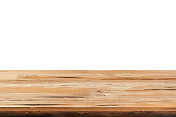 Image showing Aged natural wooden table for montage or expose products on a white background.