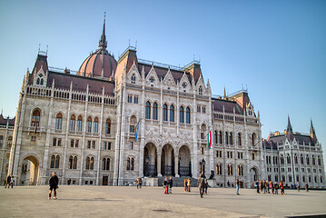 Image showing The Hungarian paliament building with walking people around square, Budapest.