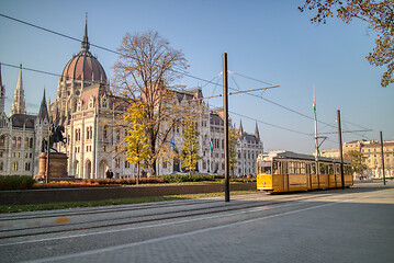 Image showing Square before Hungarian paliament building with moving tram in Budapest.