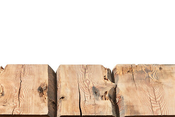 Image showing Aged wooden table for montage or display products on a white background.