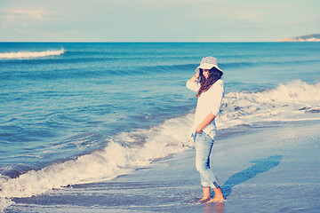 Image showing happy young woman on beach