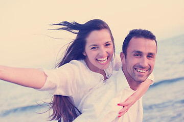 Image showing young couple  on beach have fun