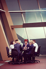 Image showing business people group on meeting at modern bright office