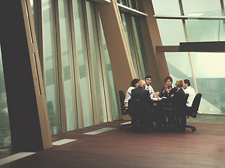 Image showing business people group on meeting at modern bright office