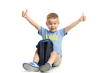 Image showing Full length portrait of cute little kid in stylish clothes looking at camera and smiling