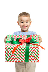 Image showing Full length portrait of cute little kid in stylish clothes looking at camera and smiling