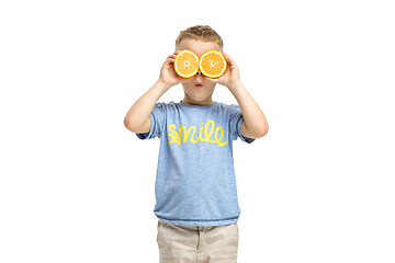 Image showing Full length portrait of cute little kid in stylish clothes with orange