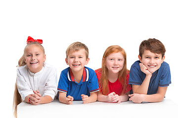 Image showing Full length portrait of cute little kids in stylish clothes looking at camera and smiling