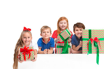 Image showing Full length portrait of cute little kids in stylish clothes looking at camera and smiling