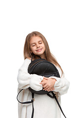 Image showing Full length portrait of cute little kid in stylish jeans clothes looking at camera and smiling